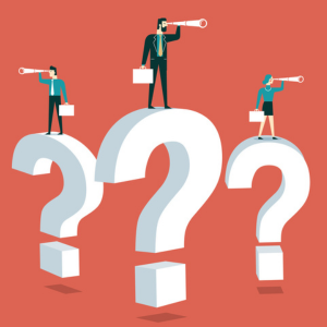 Business professionals standing on top of big question marks