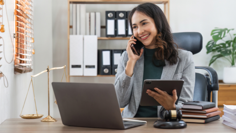 Paralegal Advanced: image of woman on the phone at a desk