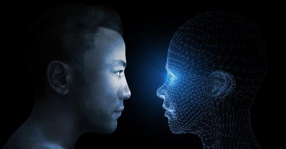Human face and robot face looking at each other