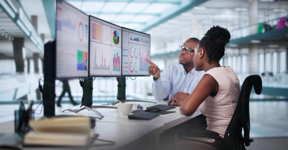 KPI Business Analytics Data Dashboard. Analyst Using Computer