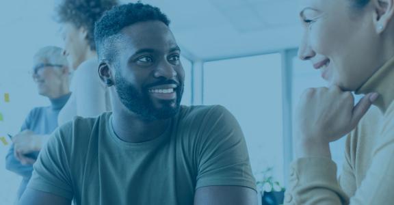 Man and Woman smiling at each other