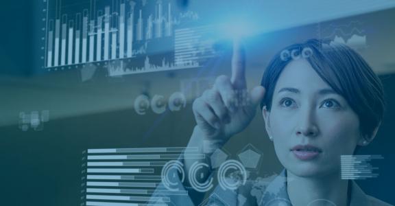 Woman pointing at 3d bar chart