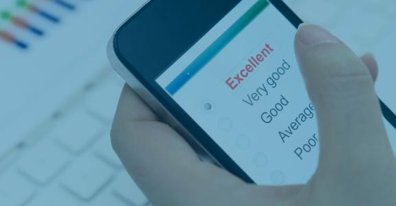 Person with phone rating a service
