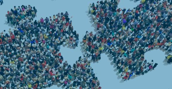 Two puzzle pieces shaped of crowd of people