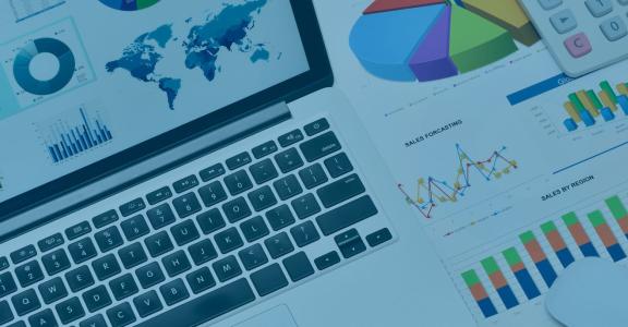 Laptop with graphs and map of US