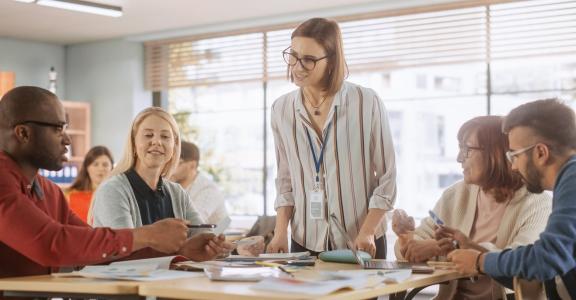 Adult students learning in a classroom