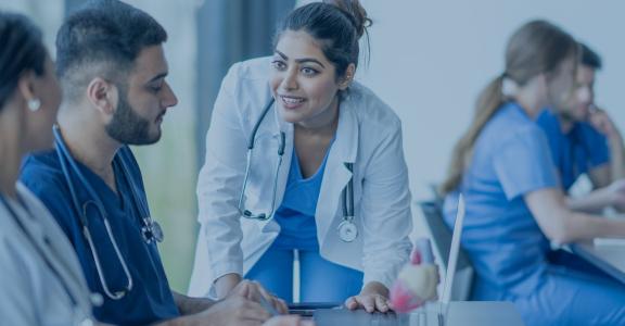 premed-lecture-series: Group of healthcare workers talking i