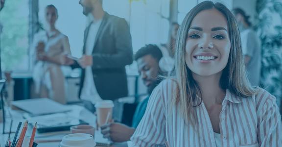 Woman smiling at camera in office