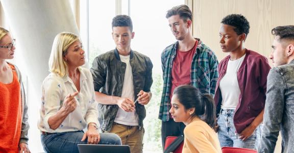 Professional Education for Ed Therapists: Teacher working wi