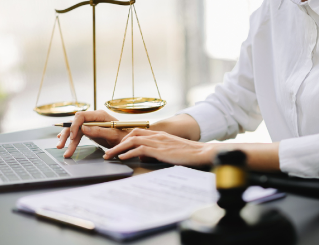 Employment Law Certificate: imae of person working at a desk