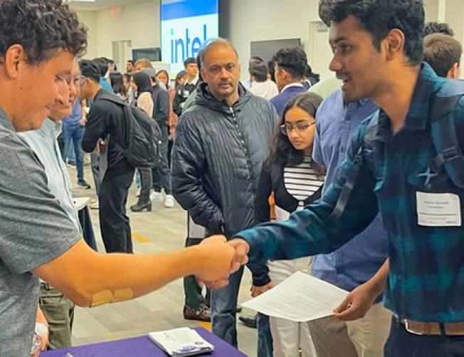 Recruiter shaking hands with a prospective employee
