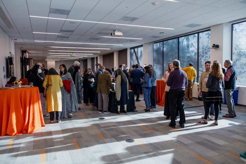 People having conversations in the event center