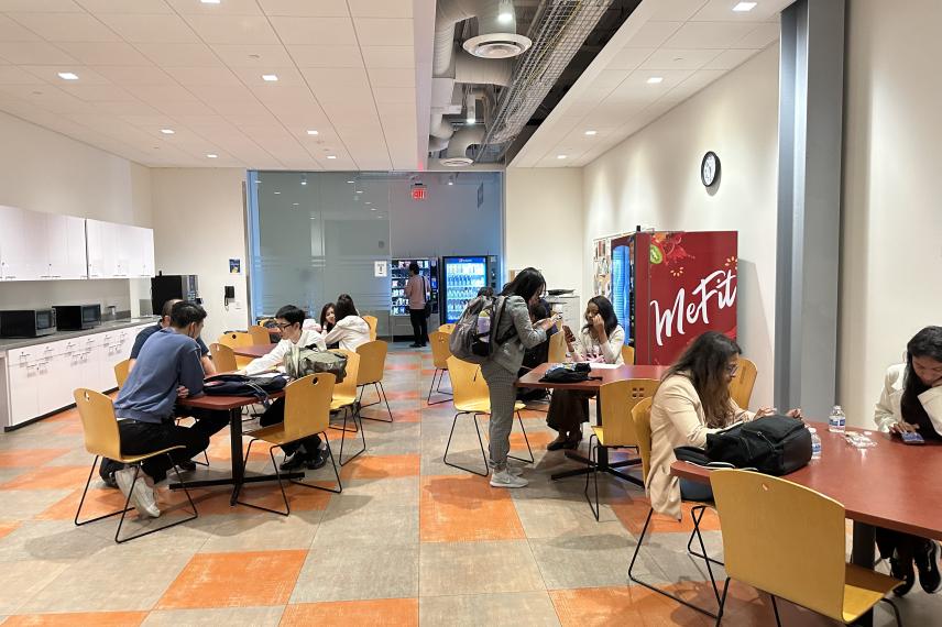 Students having lunch in the UNEX break room