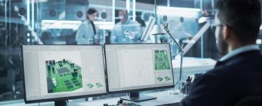 Man developing 3D Model of a Circuit Motherboard on Computer CAD Software