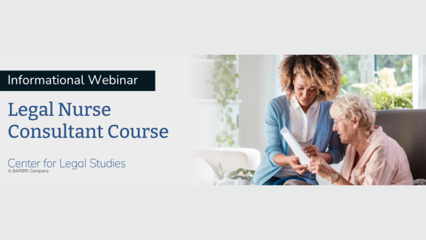 Women helping older women look at a document. 