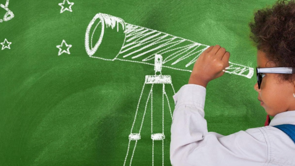 Child looking through an illustructrated telescope.