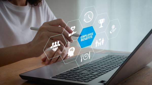 floating AI screen with web of HR icons and hand pointing to "Employee Benefits" in center of web
