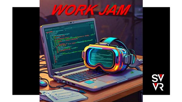 laptop on a desk with virtual reality goggles